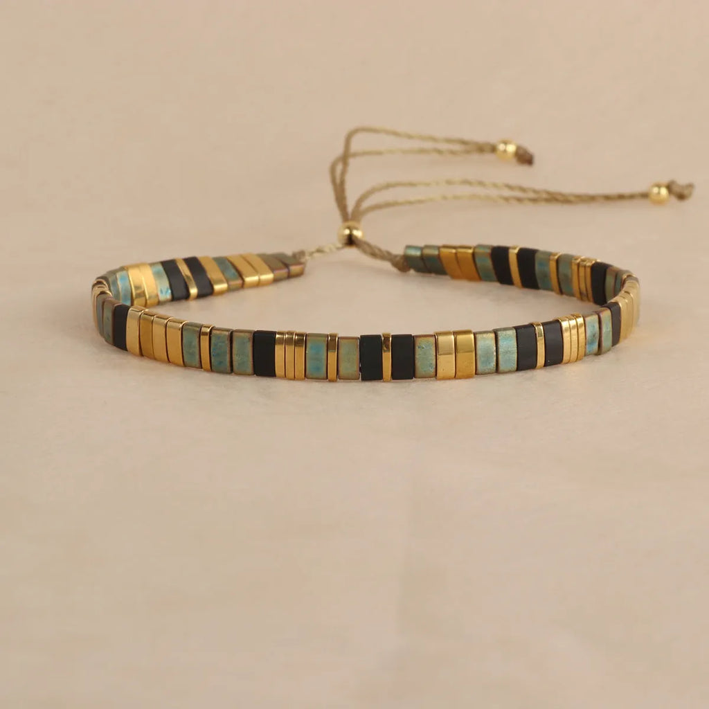 Geometric pull bead glass bracelet in multiple colour options on wrist