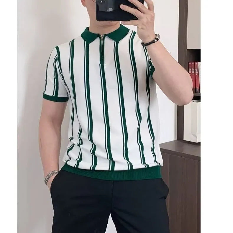 Man wearing a black vintage stripe t-shirt with a cartoon print and a zip detail on the half sleeve.
