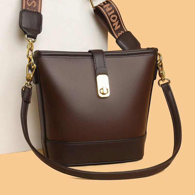 Korean style black bucket messenger bag with double shoulder straps and internal organisation pockets