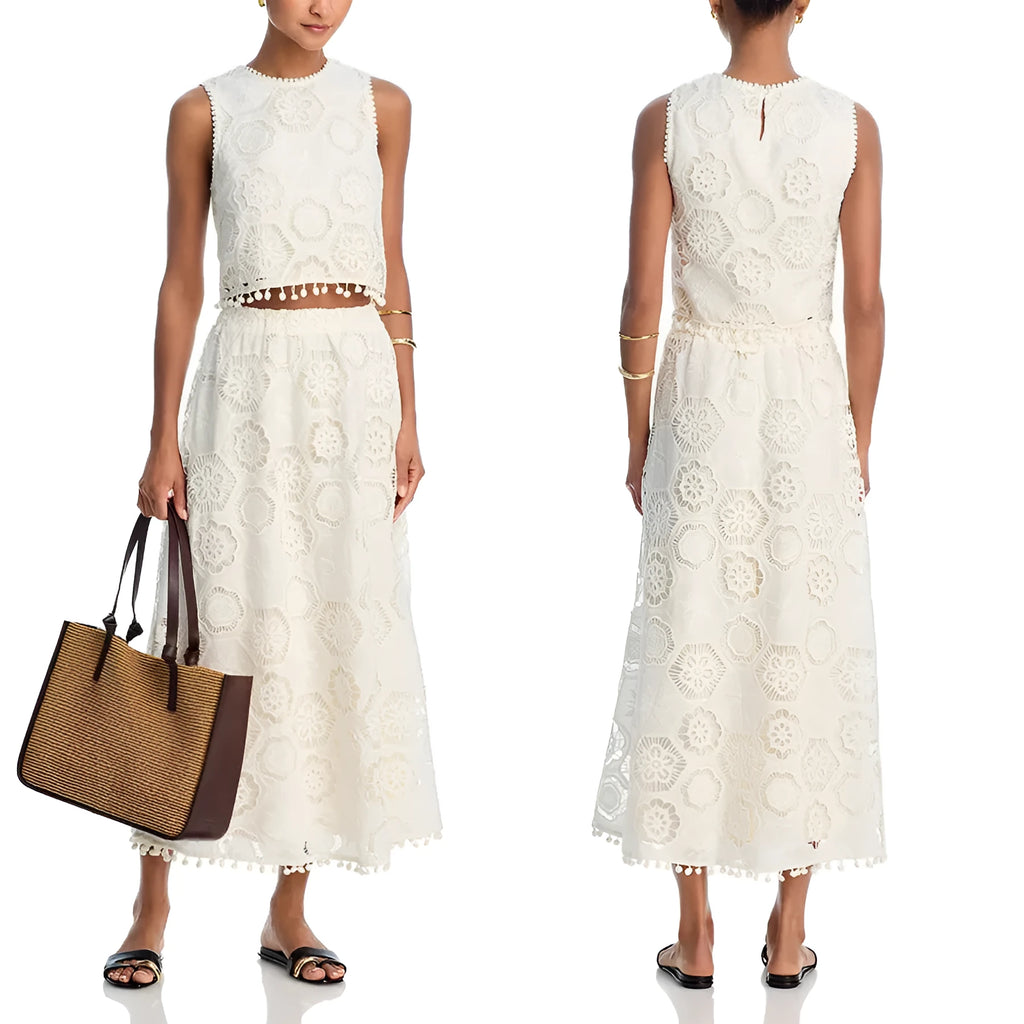 White women's sleeveless top and long skirt suit with retro embroidery details