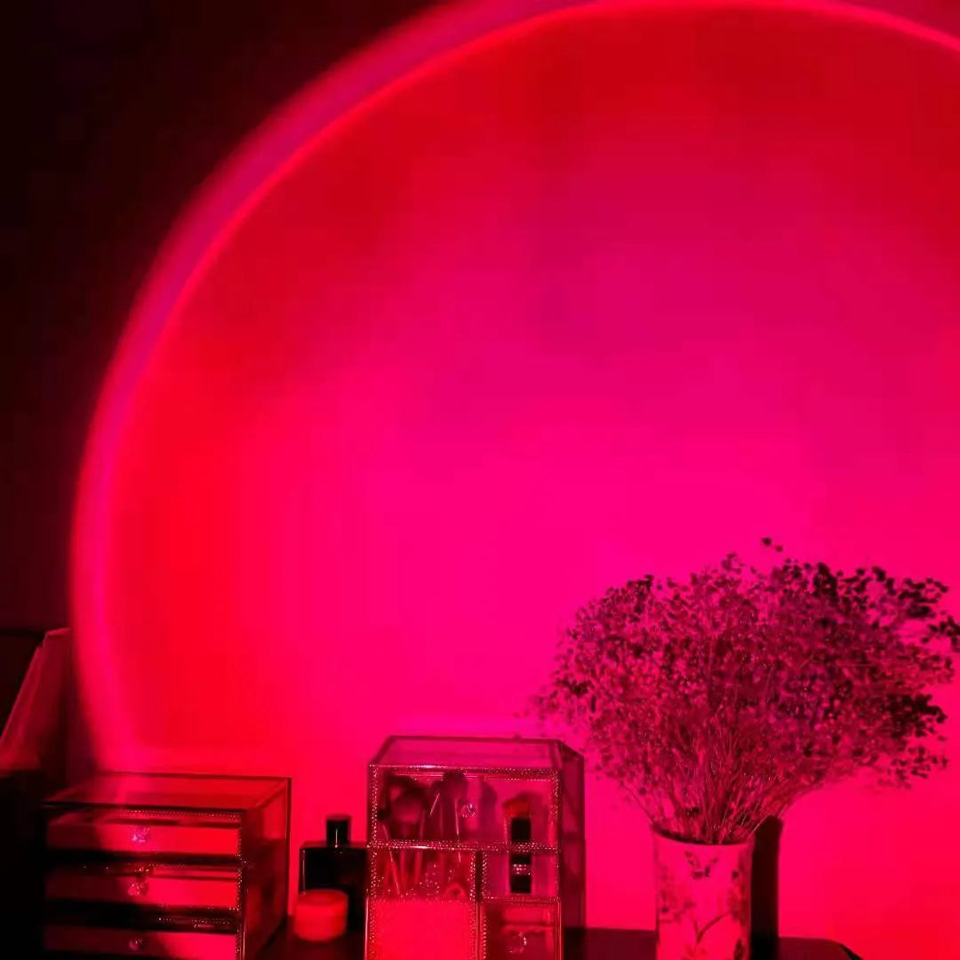 Rechargeable sunset lamp projecting rainbow colours with USB cable and push-button control