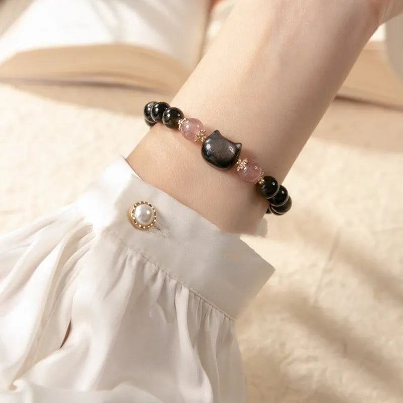 Natural obsidian bracelet with 8mm black beads and kitty charm on adjustable string
