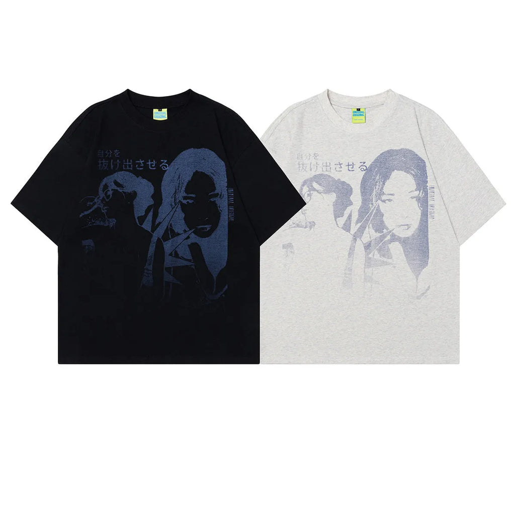 Men's loose-fit grey cotton T-shirt featuring a retro graphic character print on the chest.