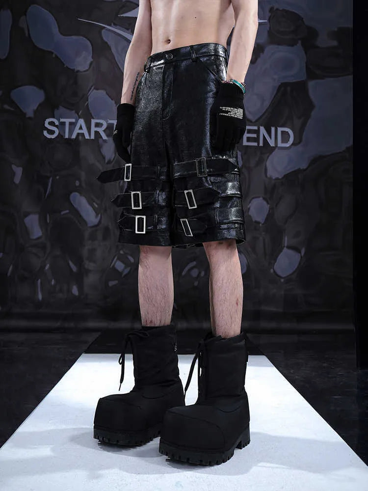 Men's black PU leather cropped shorts with leather ring detailing on leg