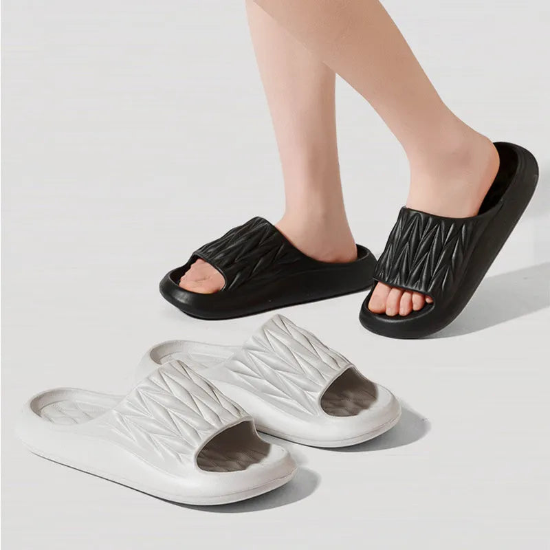 Leaf texture patterned EVA foam slippers for indoor household use, shown in multiple colours.