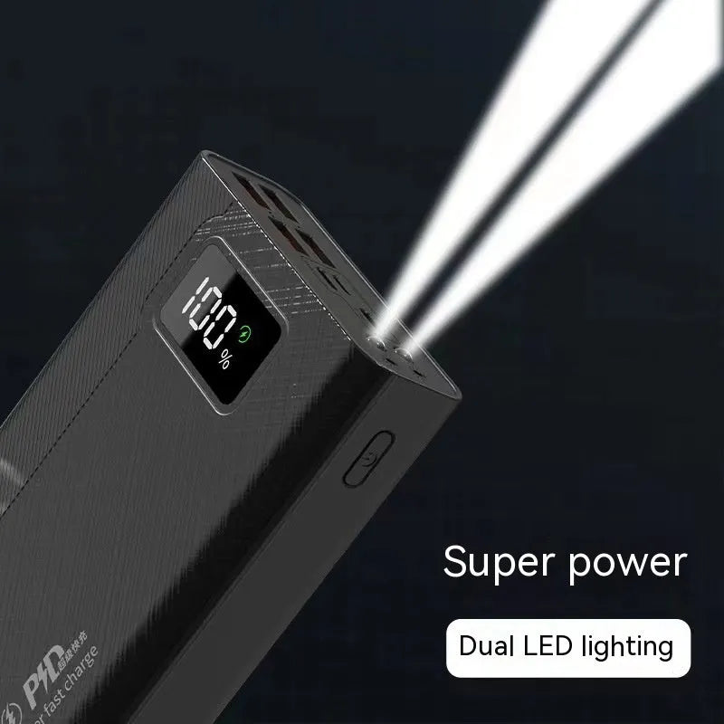 Large capacity power bank in black or white plastic casing with dimensions 150mm x 76mm