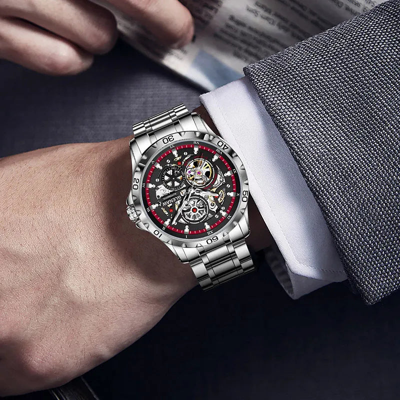 Silver automatic mechanical watch with hollow-out design showing movement through transparent back