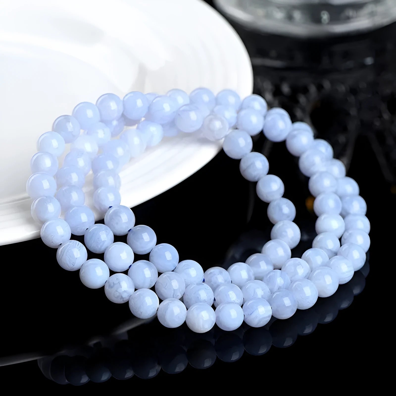 Blue agate bracelet with natural striped beads and scattered Ruyi charm elements