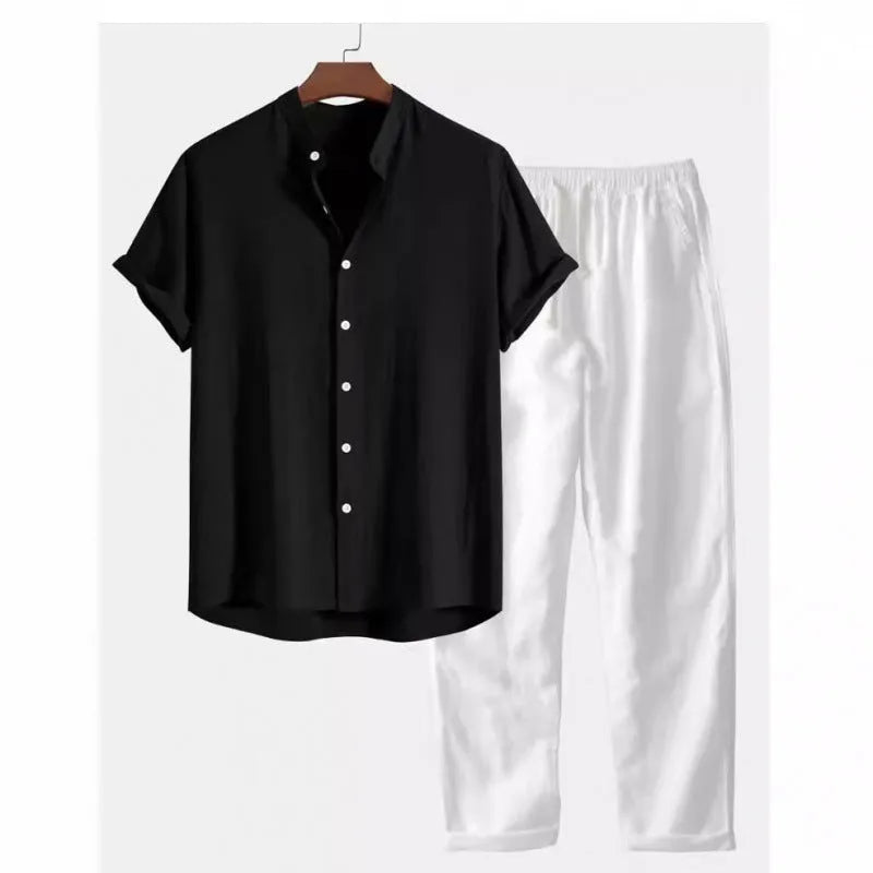 Man wearing a loose-fit linen-blend short sleeve shirt and matching casual trousers from a co-ord suit set.