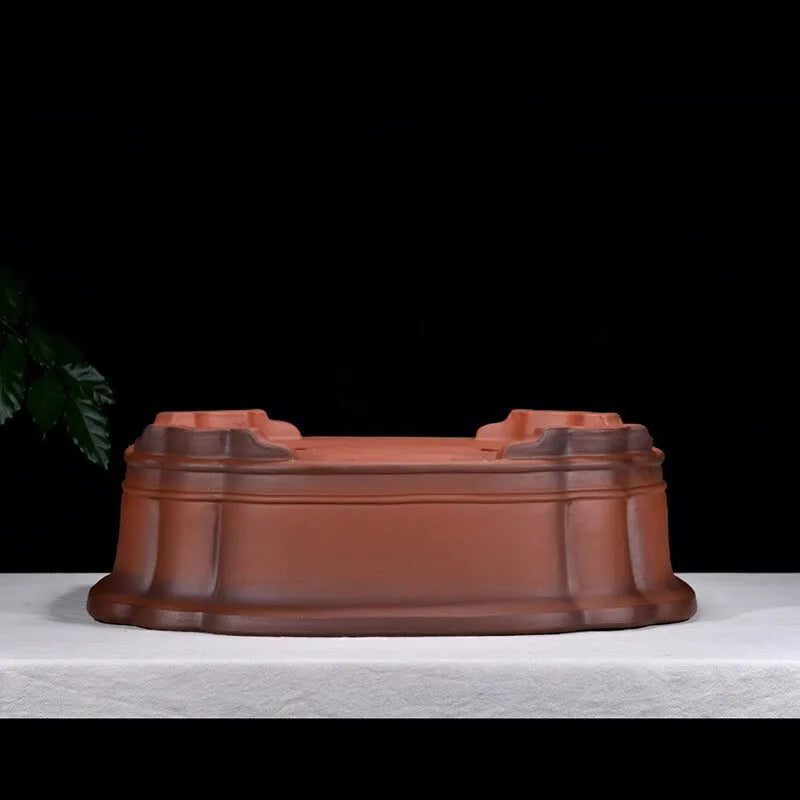 Large antique-finished Chinese purple clay flowerpot measuring 71cm long