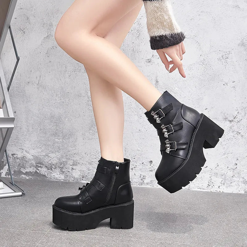 Black women's punk bat buckle gothic short boots with side zip and thick heel.