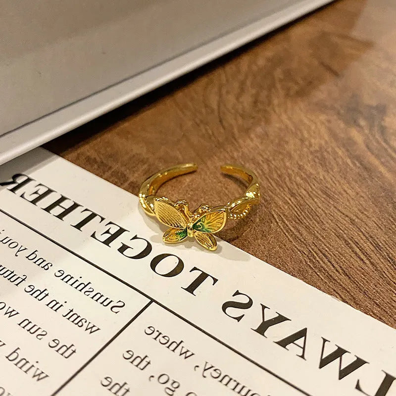 Copper butterfly women's ring with creative Chinese design and dripping oil finish