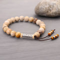 Wood colour stone bead bracelet with handmade construction and retro styling