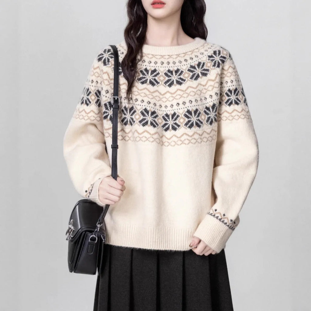 Women's milky white Fair Isle patterned knitted pullover sweater with a crew neck and long sleeves.