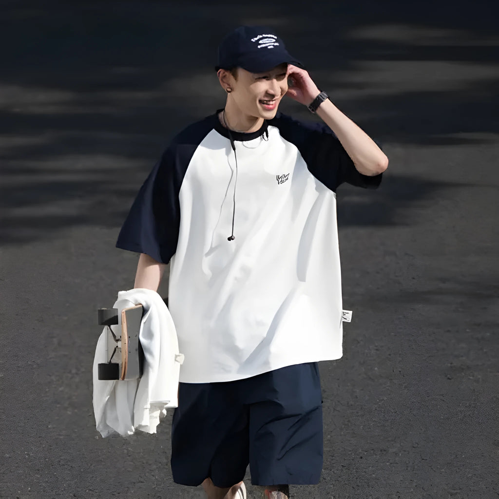 Men's blue Japanese junior style raglan sleeve t-shirt with loose fit on hanger