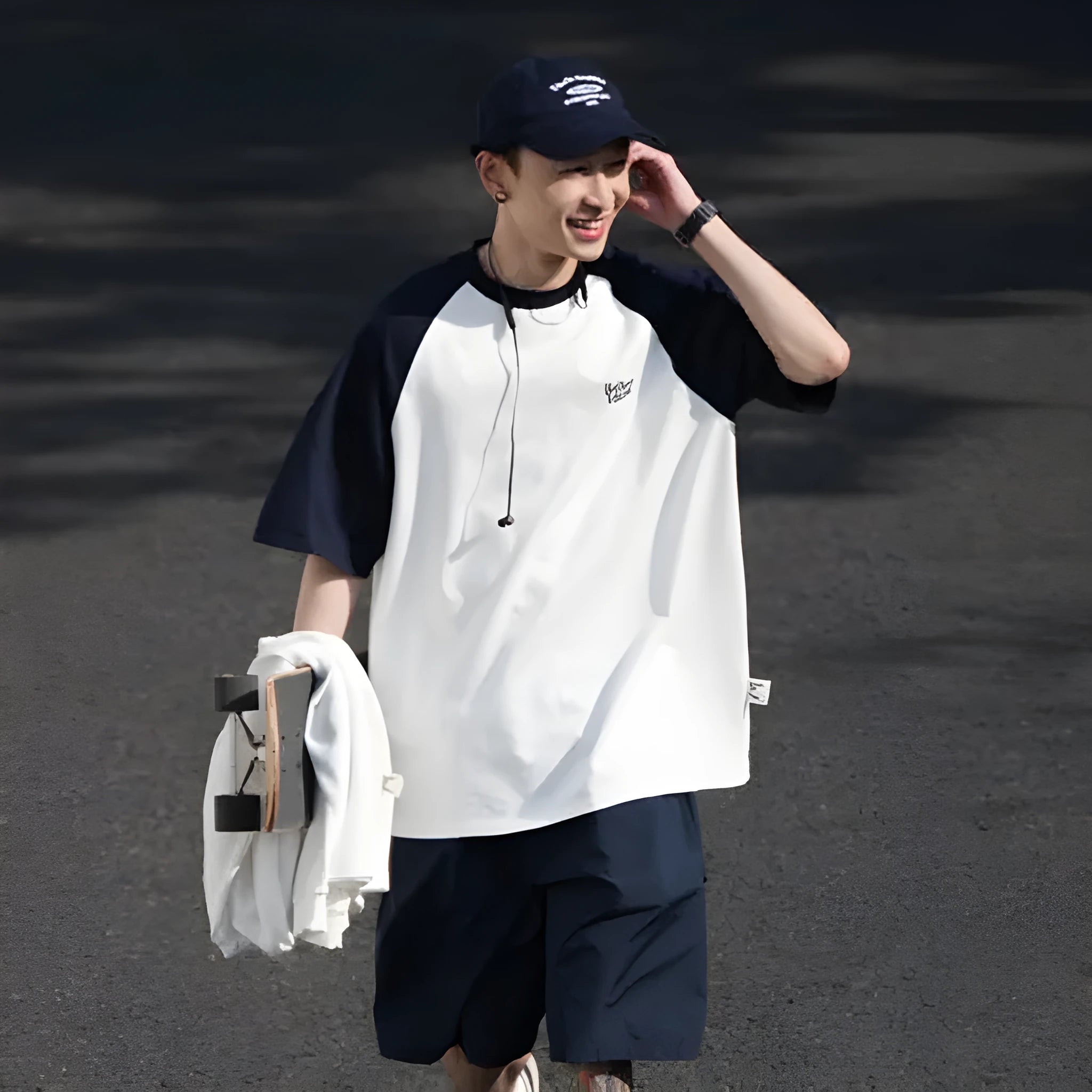 Men's blue Japanese junior style raglan sleeve t-shirt with loose fit on hanger