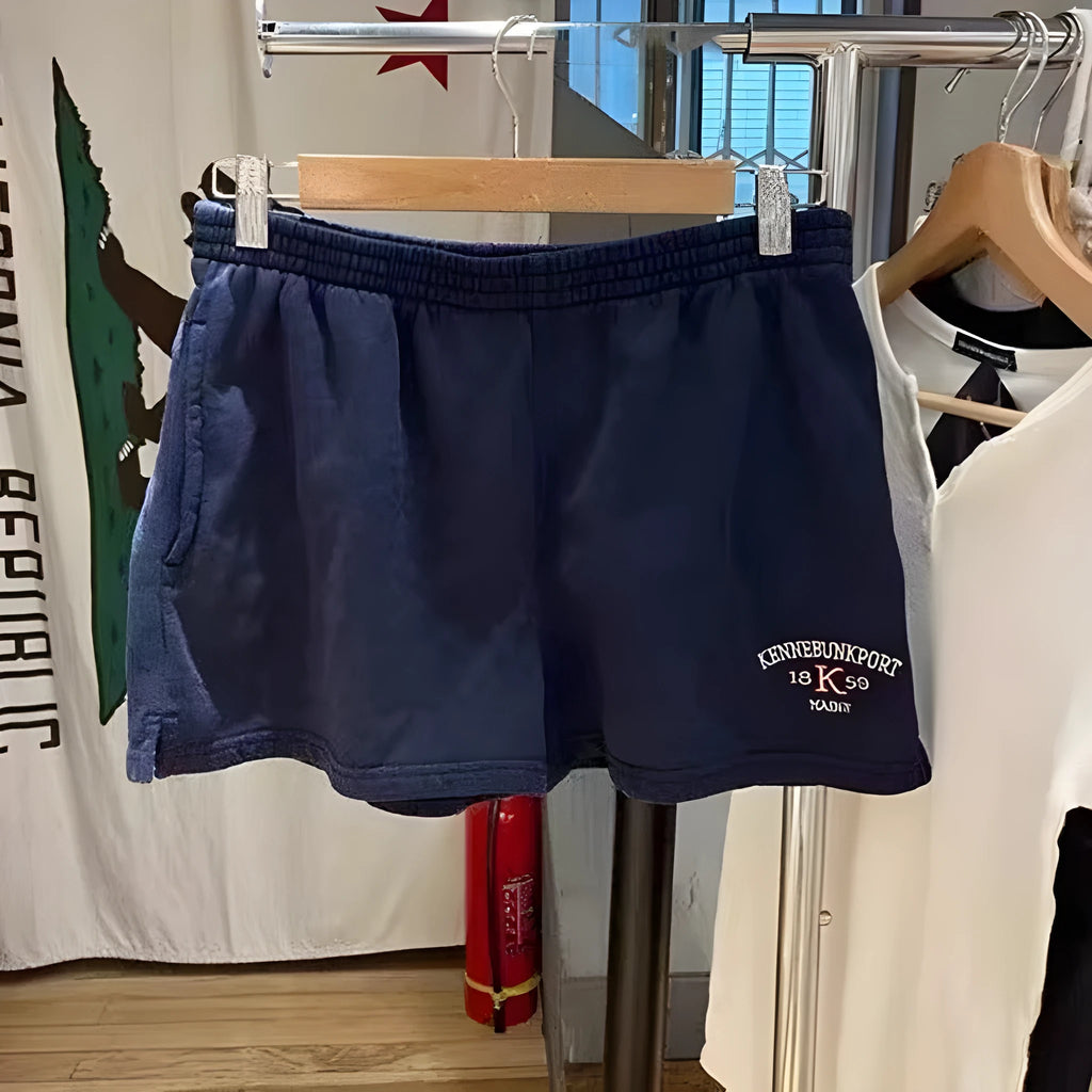 Women's cotton sports shorts with white flag embroidery in dark blue colour