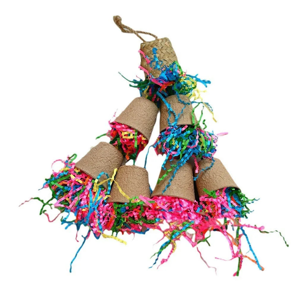 A wood-coloured parrot toy shaped like a paper cup with palm weaving texture, hanging from a string.