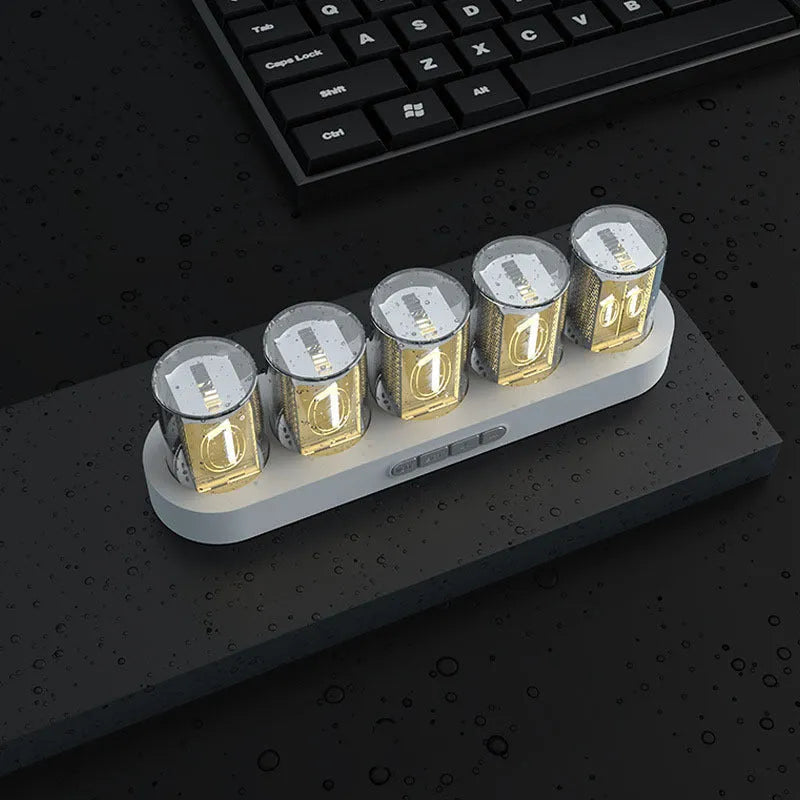 RGB Luminotron LED digital clock showing colourful display on desktop