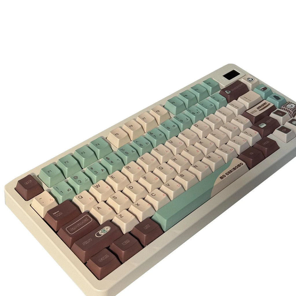 Matcha green theme mechanical keyboard keycaps with ergonomic CAP adaptive shafts on a white background.