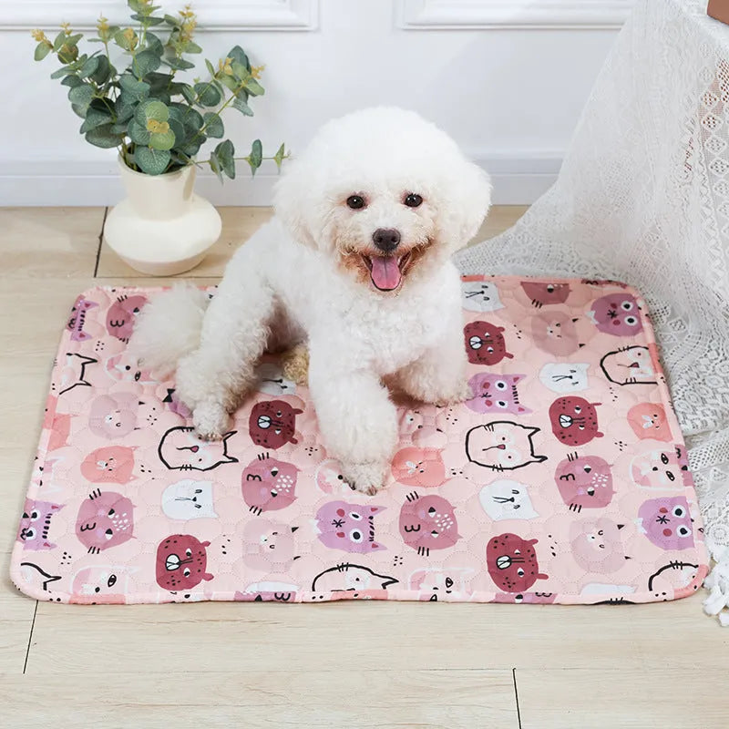 Reusable cloth pet urine pad with colourful animal print and waterproof backing.