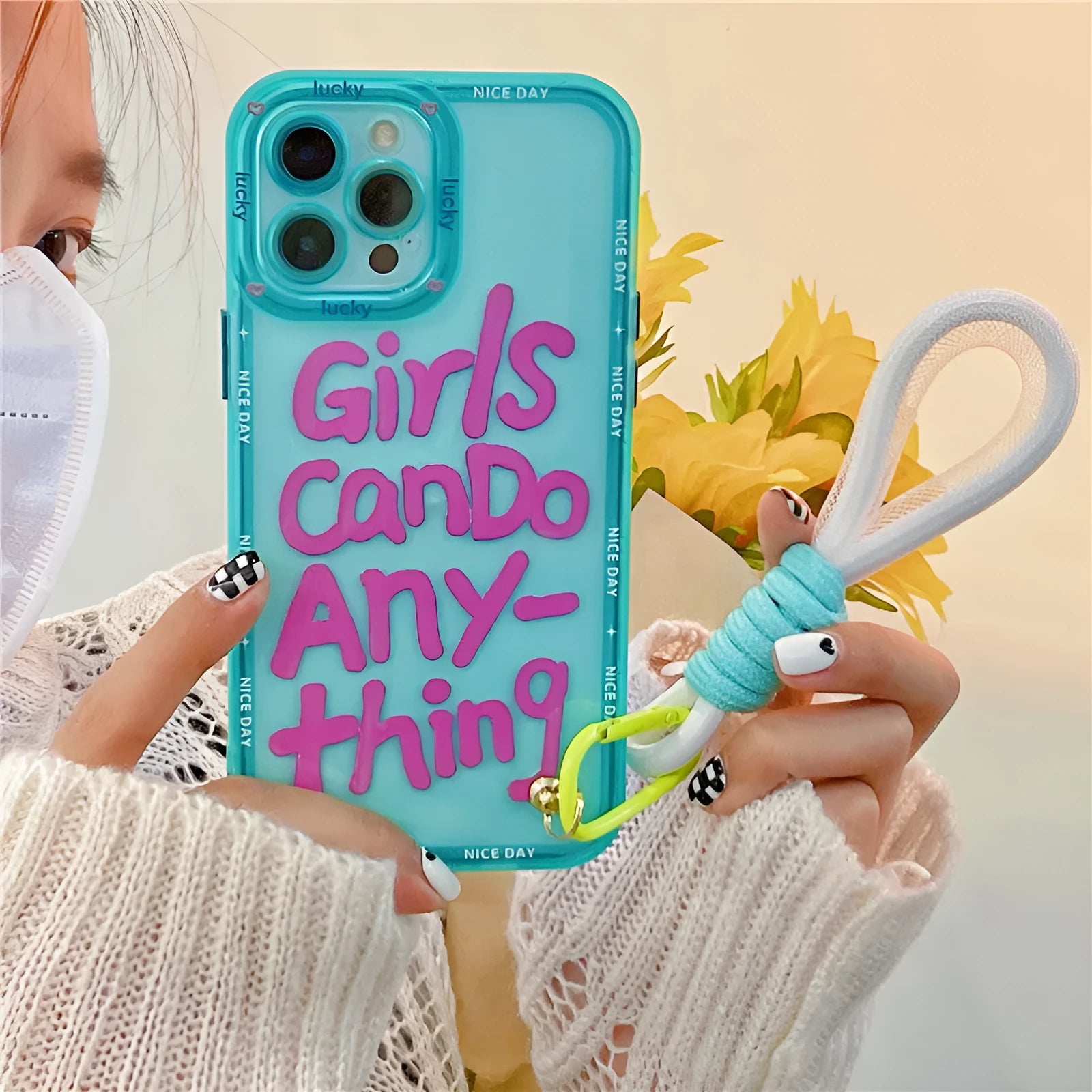 Graffiti design iPhone case with detachable lanyard in mint green colour with painted animal artwork