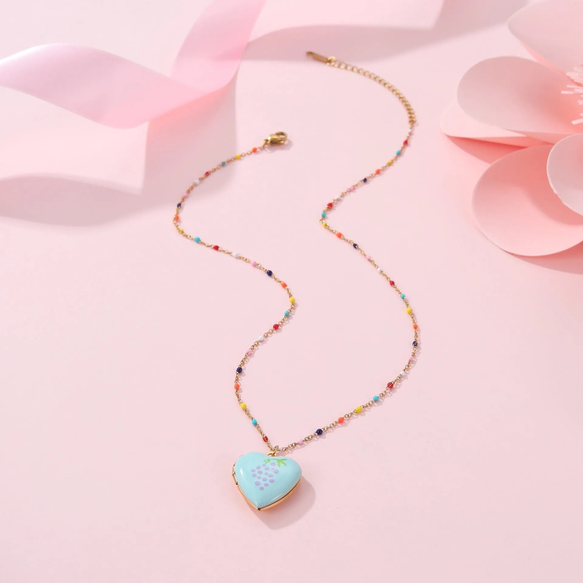 Gold plated fruit charm necklace with heart-shaped pendant on adjustable stainless steel chain