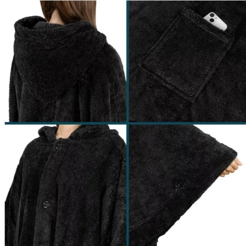 A thick pink hooded bathrobe with long sleeves and a cardigan-style front, laid flat.