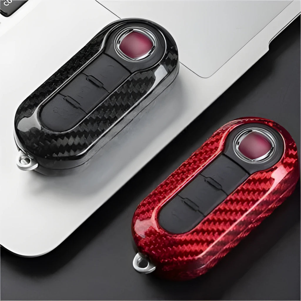 Carbon fibre and glass fibre car key replacement shell set showing black, red, and silver black colour options
