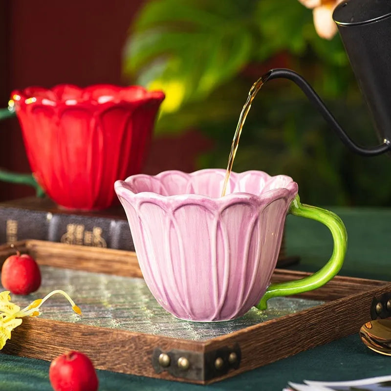 Ceramic breakfast cup with red and purple flower pattern, 500ml capacity.