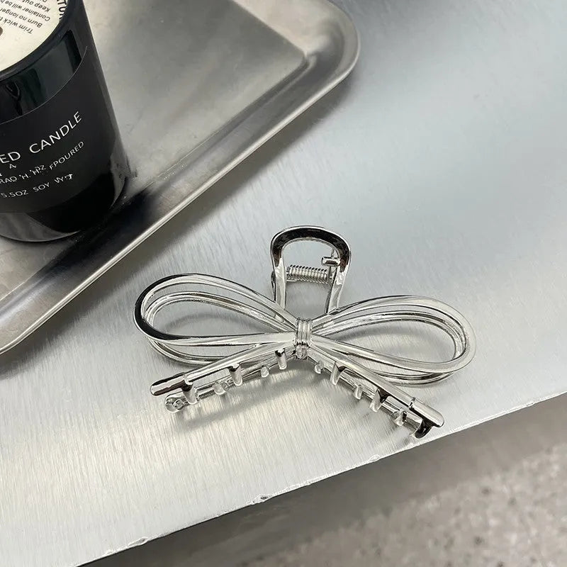 Alloy bow barrette hair grip for women in silver and gold Korean style