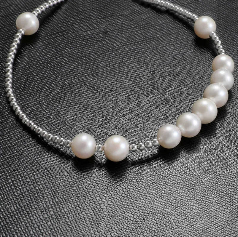 Unisex pearl necklace with bead on 51cm chain, silver spacer