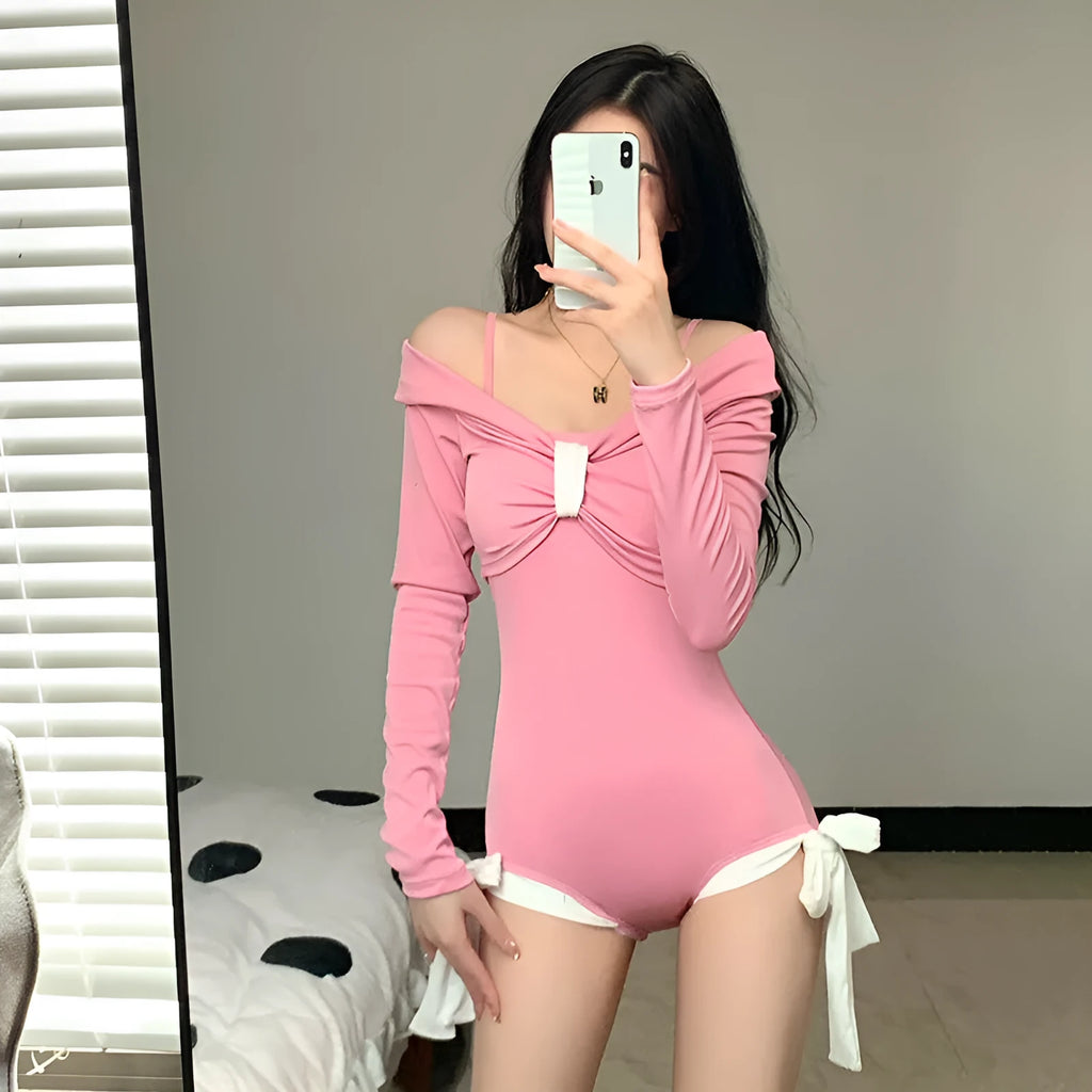 Women's long sleeve one-piece swimsuit in pink and black colours