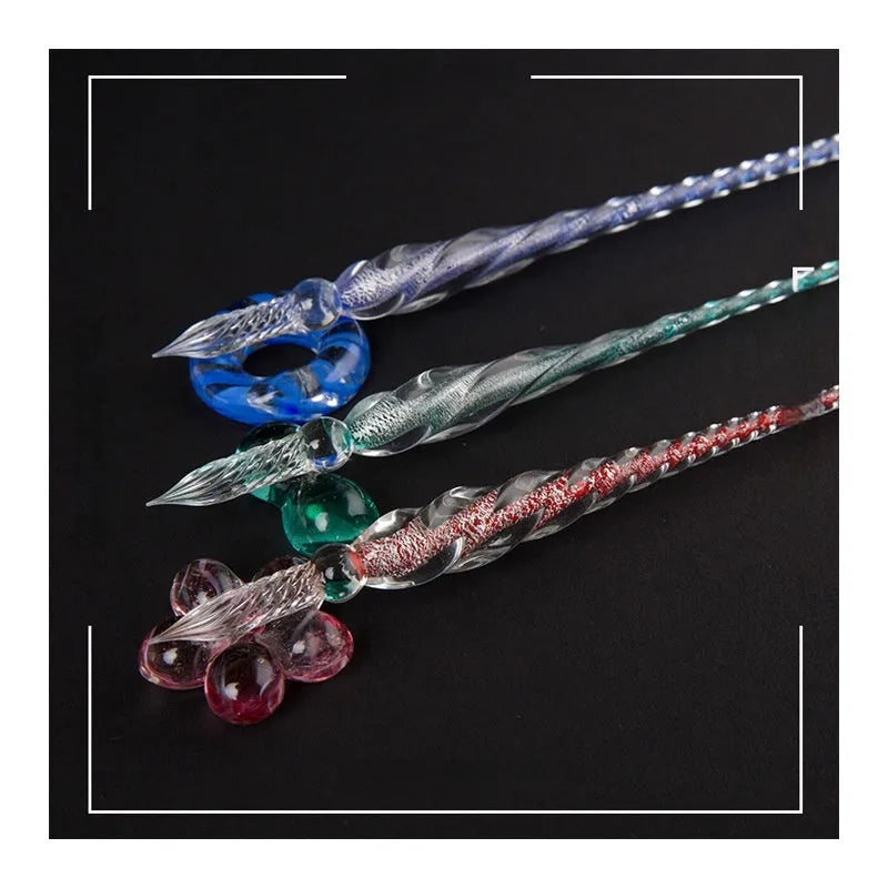 Transparent coloured glaze crystal pen in a gift box, showing abstract glass design.