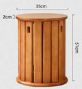 Four stackable round iron dining stools in modern design with graphic customisation options