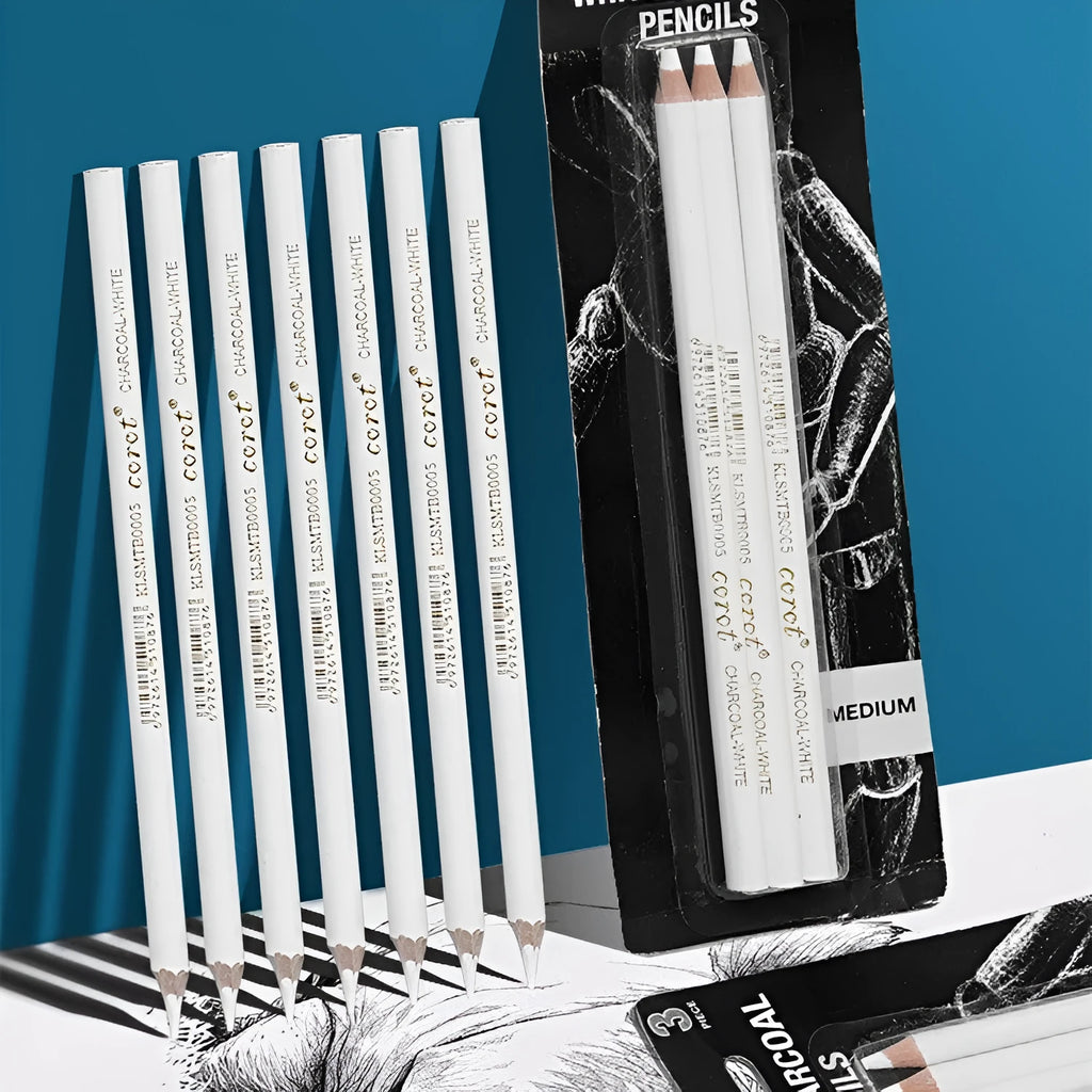 Three white charcoal sketching pencils with wooden casings for highlight work