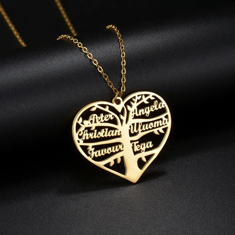 Custom engraved women's necklace with hollow heart and tree pendant on an adjustable chain.