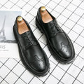 Men's black and brown brogue shoes with round toe design and artificial PU upper