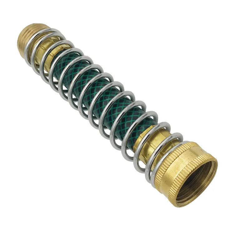 Brass garden hose spring connector with spiral visible inside, shown next to a tape measure indicating 15 cm length.