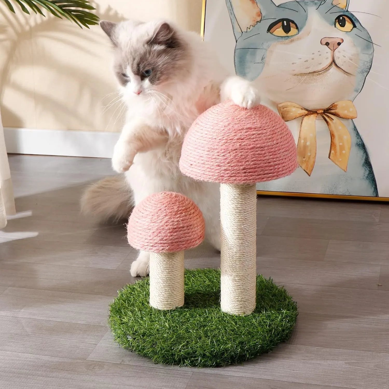 Pink mushroom-shaped cat scratching post made from natural sisal with a sturdy base.