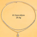 Gold or silver waist chain with a water drop rhinestone pendant and lobster buckle.