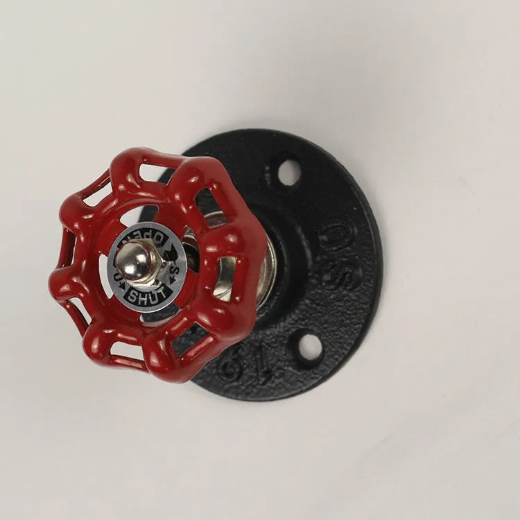 Modern minimalist metal wall hook in a water pipe style, shown in black, green, and red colour options.