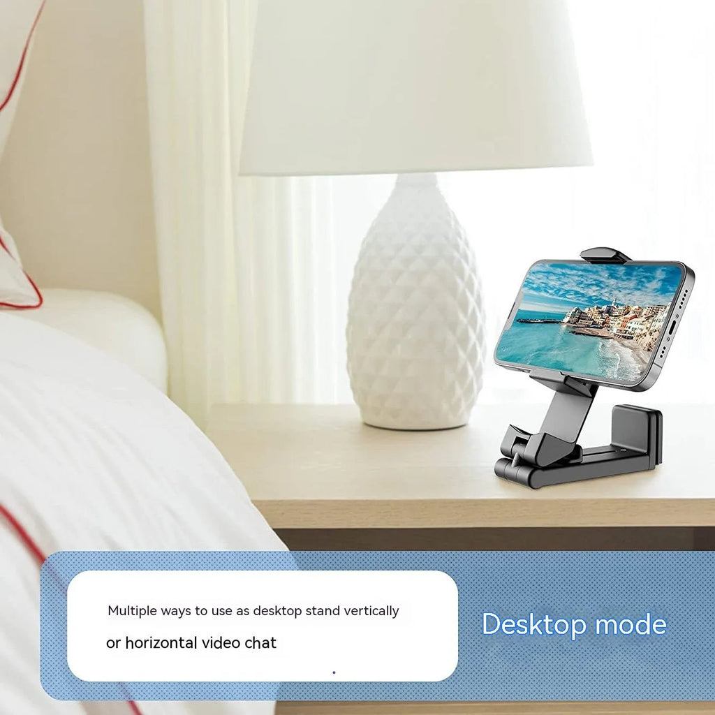 Foldable rotating phone holder in black, grey or green colours on a flat surface