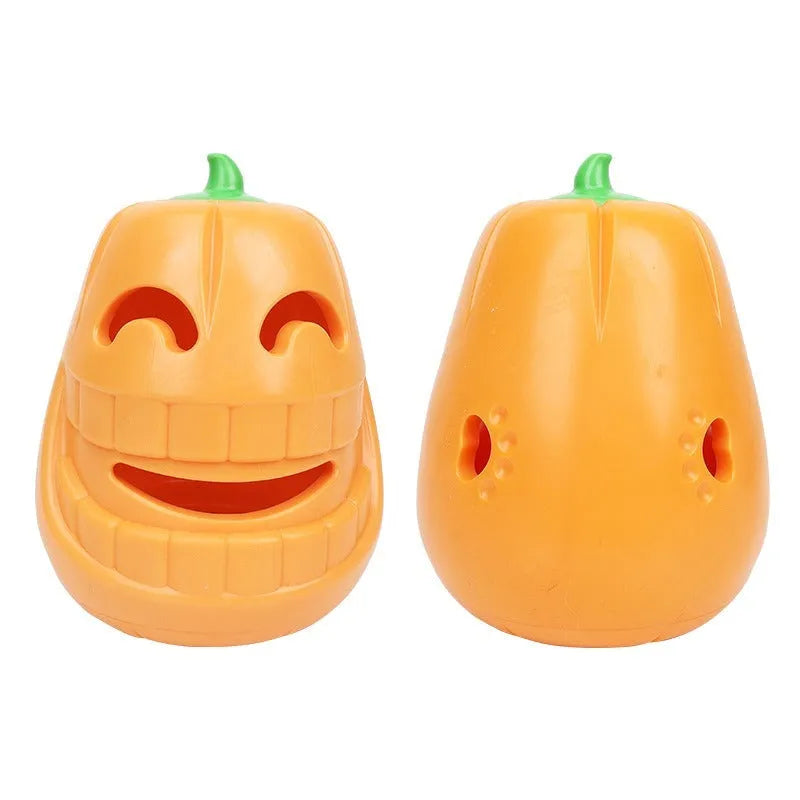Orange Halloween pumpkin shaped rubber dog toy with a hollow centre for treats.