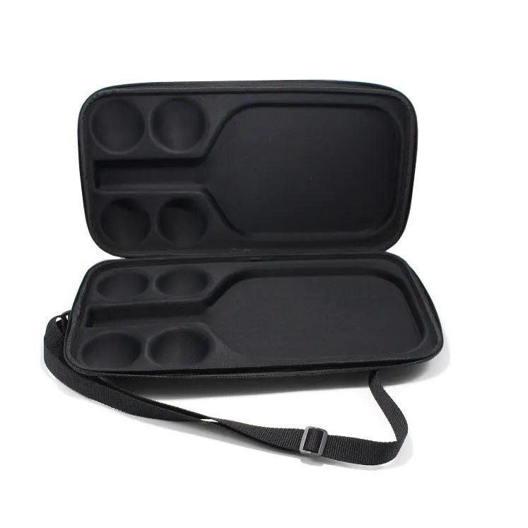 Black Peak pickleball racket storage bag with dual shoulder straps on a grey background
