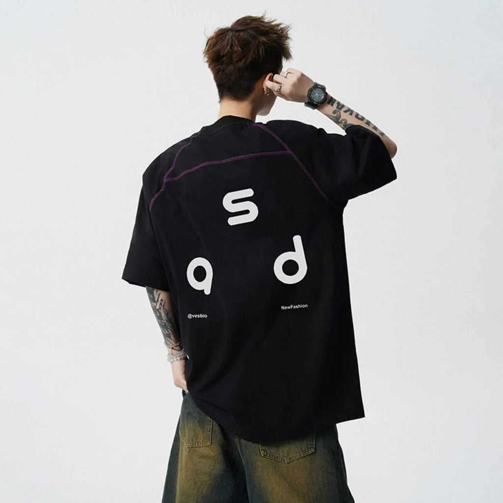 Cotton loose fit short-sleeve T-shirt with letter print on front, shown in black colour