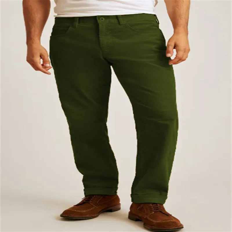 Green corduroy trousers with loose fit straight leg design and zip fly closure