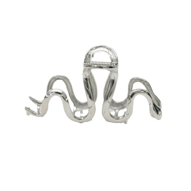 Slytherin serpentine metal hair barrette in silver or gun black finish measuring 10.5cm