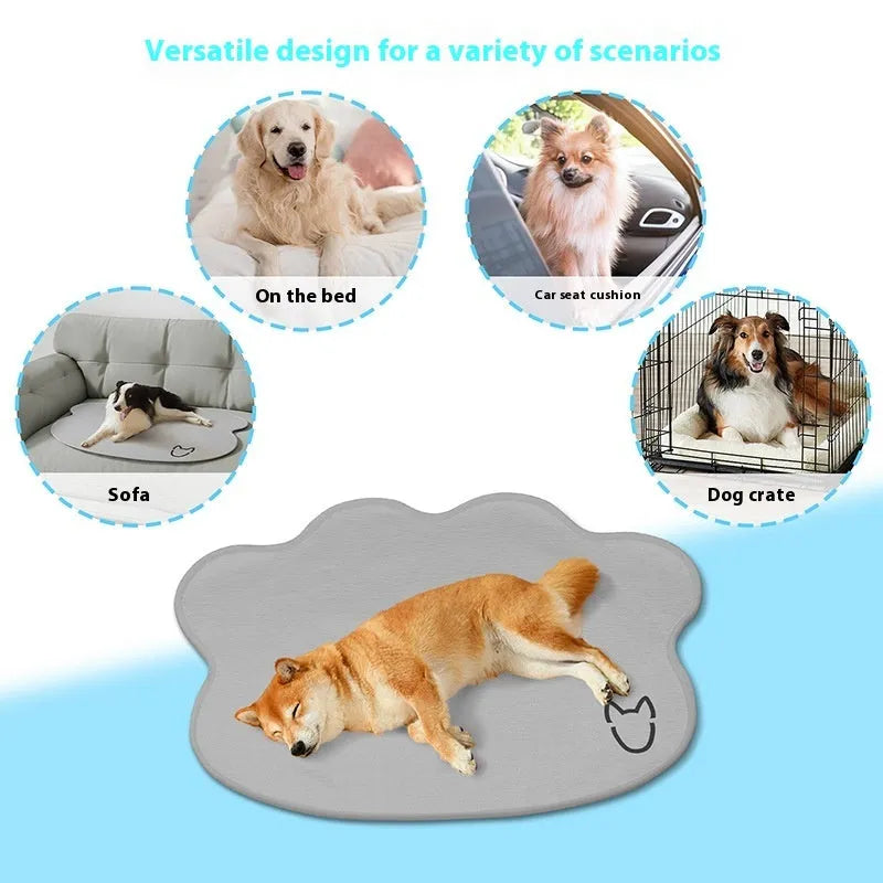 Ice silk pet cooling mat for dogs in a simple dog head shape, shown in a light grey colour on a wooden floor.