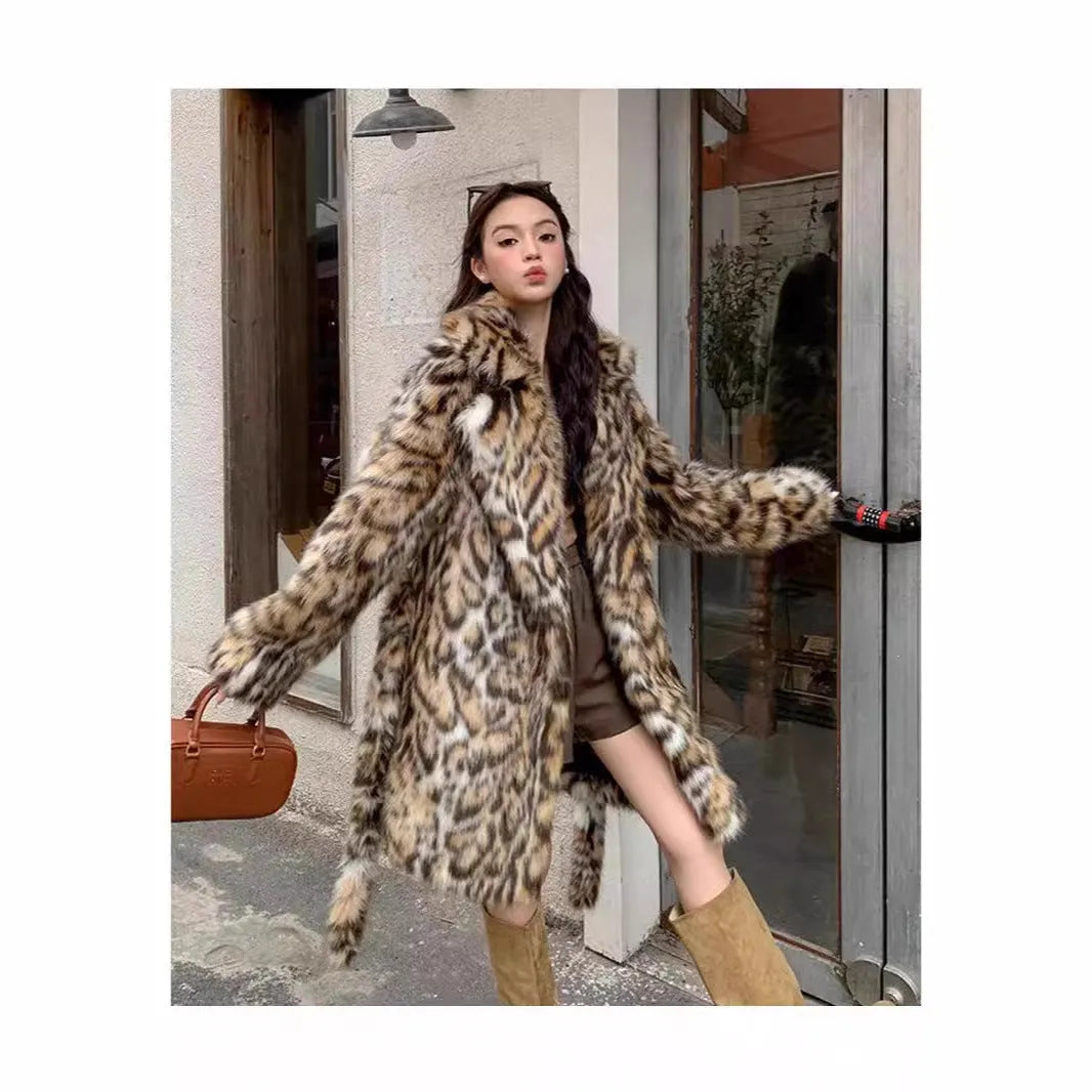 Women's faux fur coat with a large fur collar in a street fashion style.